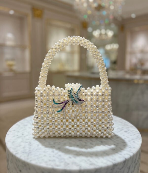 The Imperial Bird of Paradise Minaudière front page